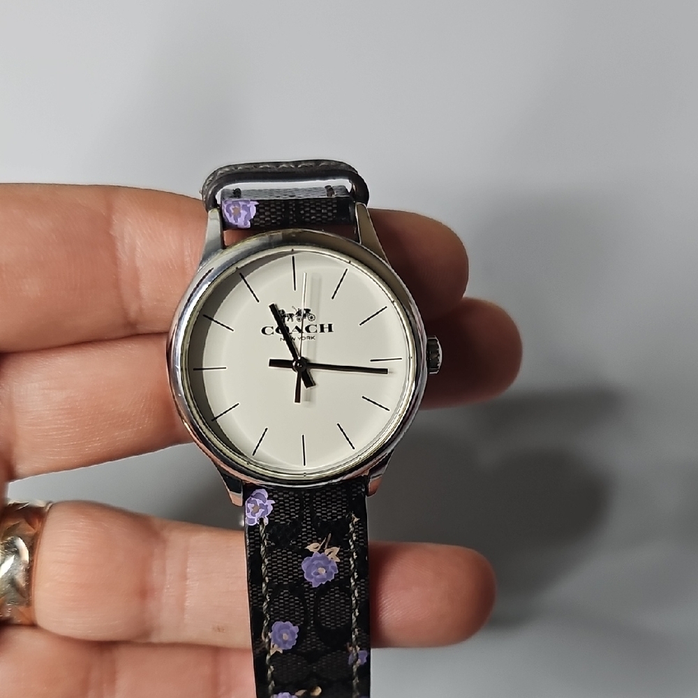 Coach Women's Black and Purple Floral Watch, needs a battery.